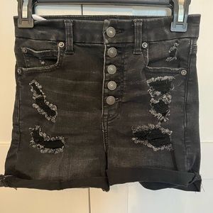 Distressed black jean shorts